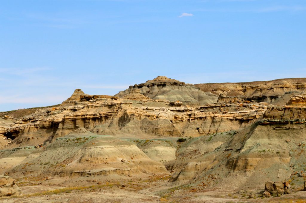Colorful strips across rock formations in Green River, Wyoming.