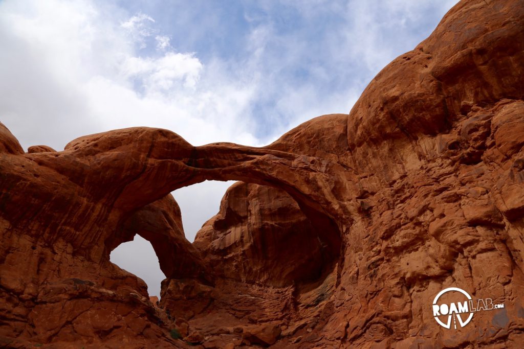 The Double Arch at the moment that the clouds parted, the sun shone down, and I had a chance to wipe the sleet off my lens.