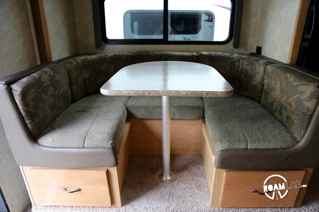 This is an example of the type of dinette that a pull out camper could afford. I understand the rational for the design, but as we aren't trying to fit eight people around the table, it's a waste of space and weight.