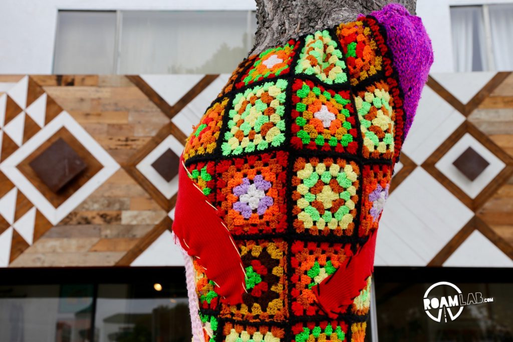 Crochet treehugger outside of the Time Travel Mart
