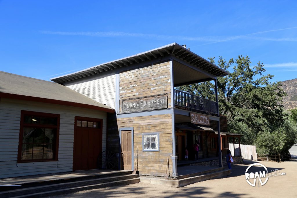Of course, while Paramount Ranch can be seen as a full sized western town, it doesn't mean that sometimes a facade is just a facade. Here you can see a sign for Mining Equipment and a door, yet the space behind is not enclosed and, in fact, on the other side is the sign for the saloon!