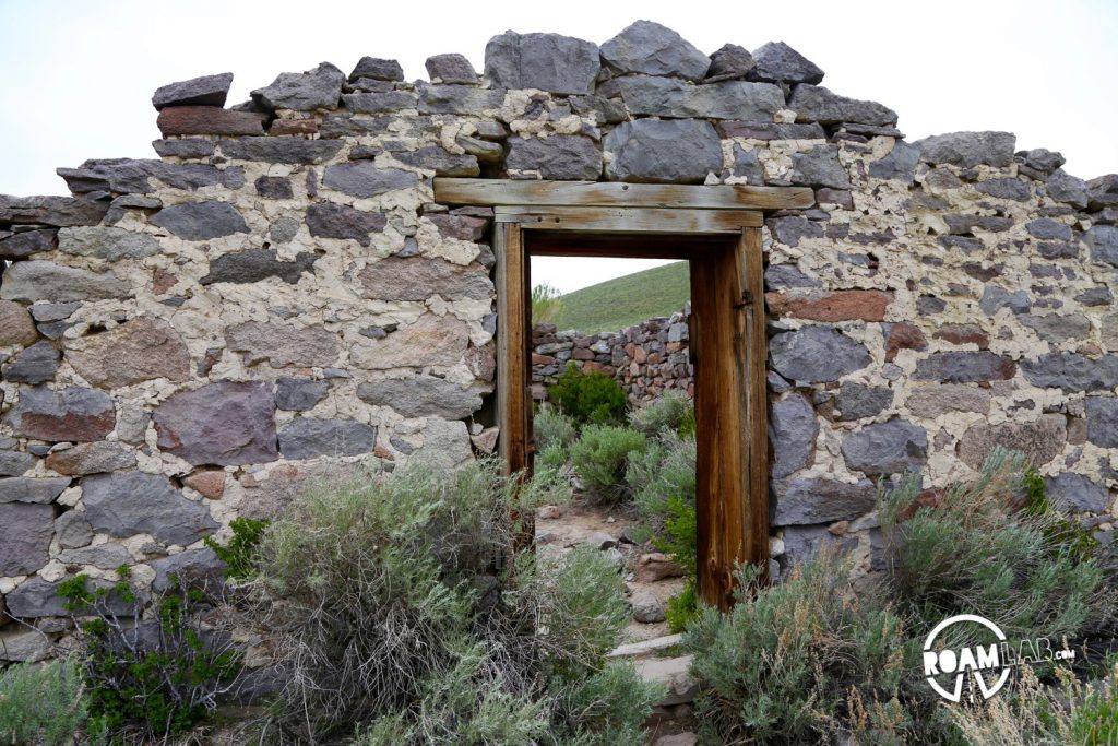 Some structures only remain in parts, leaving doors to nowhere and lonely windows.