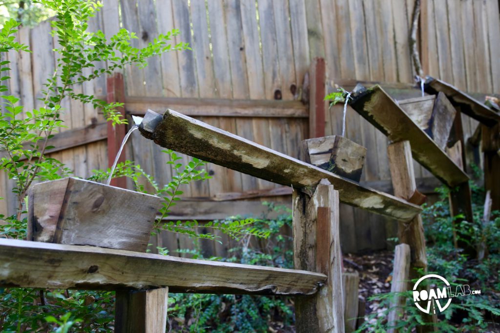 After walking out of the Gravity House, the water in this sculpture might as well be flowing up.