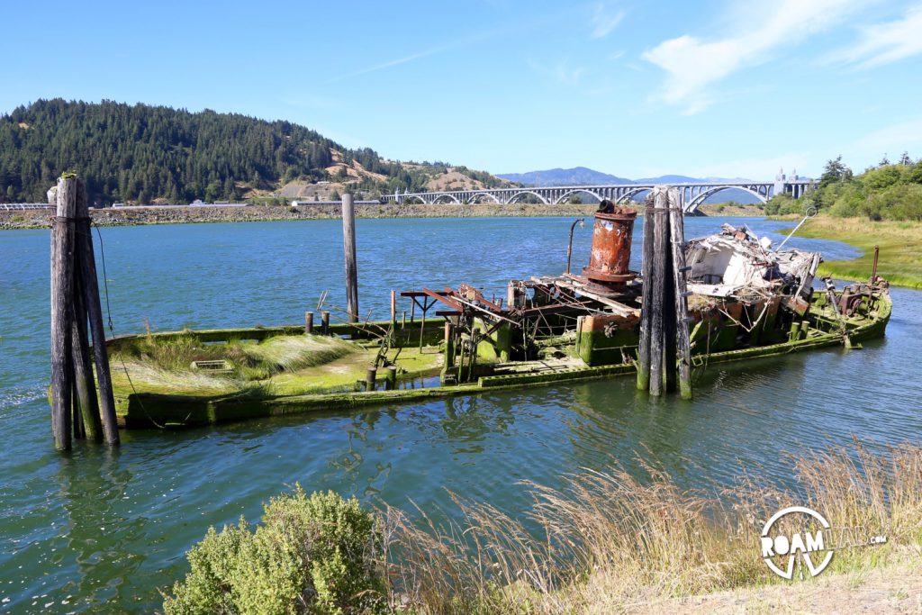 The remains of the over century old Mary D. Hume, half sunk in the Rogue River of Gold Beach, Oregon