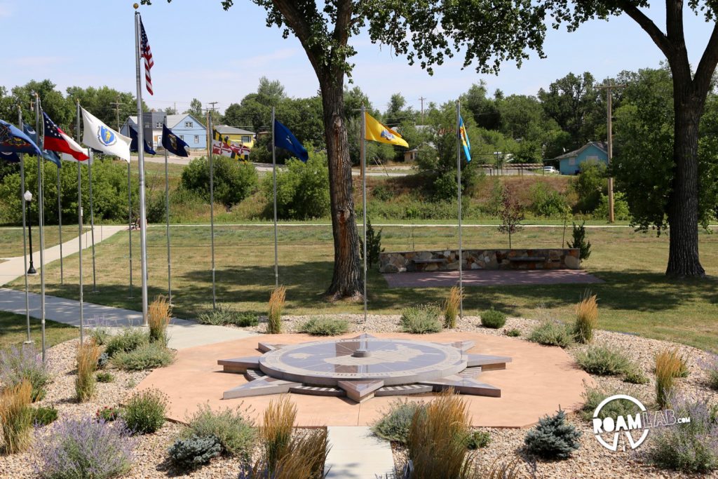 Center of the Nation Monument, flanked by flags from around the US.