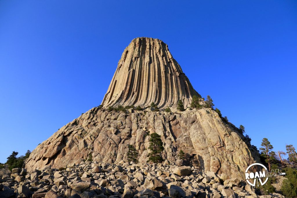 The Devil's Tower looks over a path that tightly circles the base.