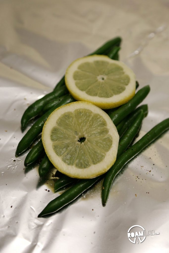 Campers Tinfoil Green Beans makes for one of the simplest and most satisfying vegetable dish for camping and all it takes are green beans, lemon, salt, pepper, and olive oil.