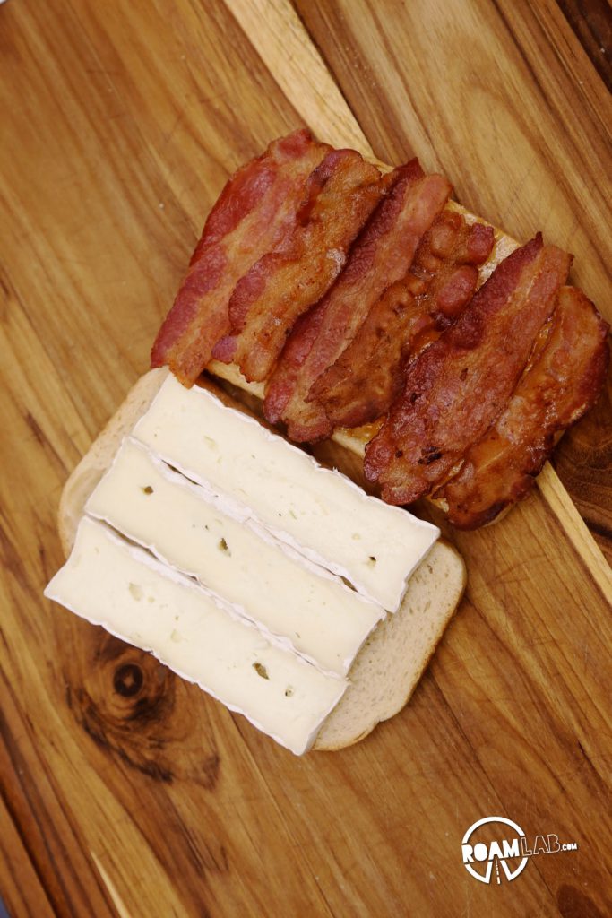 The bacon is all lined up for a Glamper’s Bacon Brie Apricot Toasted Sandwich