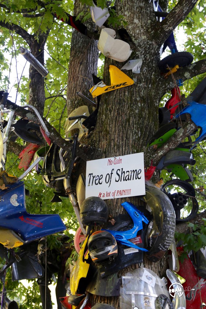 While some motorcyclists may bare the scars of their accidents along the Tale of the Dragon,  the Tree of Shame bears the remnants of their wrecked equipment.  Smashed helmets, displaced mirrors, and cracked fiberglass are all suspended from the branches of the tree along with notes poetically relaying their doomed encounter with The Dragon.
