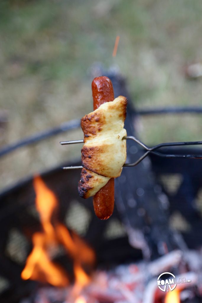 The Spit Fire Hotdog Wrapped In Pastry is the ultimate compromise between a lazy and a lavish campfire dinner recipe.  You can keep it simple or add any and all twists to make it the perfect expression of you...for your tummy.