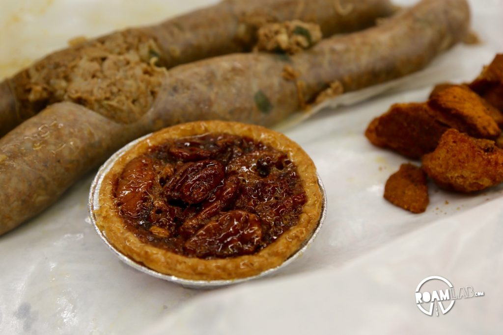 It was late and we hadn't eaten when we filled up our tank in a town boasting of their boudin and cracklings. We shrugged our shoulders. Might as well try it.