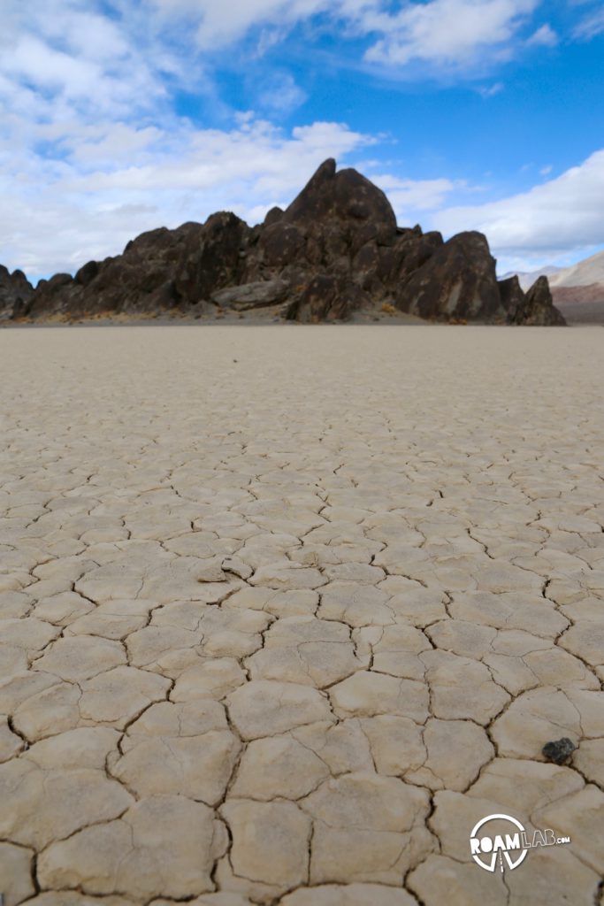 The road to the Racetrack Playa in Death Valley National Park is one long, brutal washboard past volcanic craters, Joshua Trees, and teakettles to a dry lakebed punctuated by a grandstand rock formation and sailing stones.