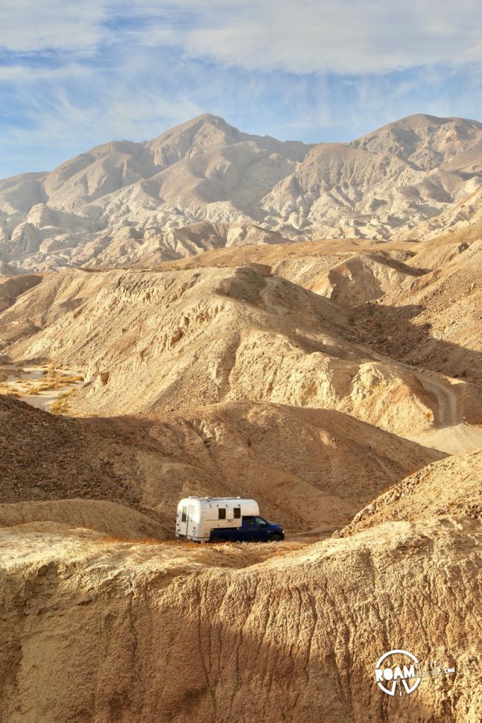 Descending into a wash with our Avion Ultra C11 truck camper on the way to Palm Slot Canyon in Anza-Borrego Desert State Park