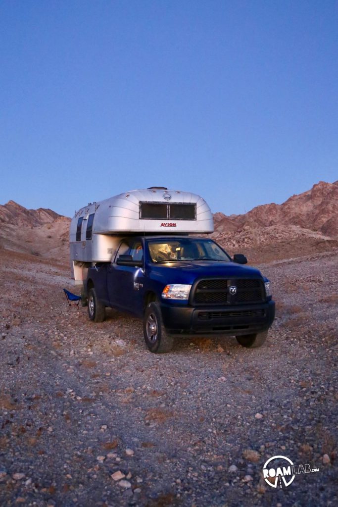 Settling in for the night, camping in our Avion truck camper in the Cargo Muchacho Mountains.