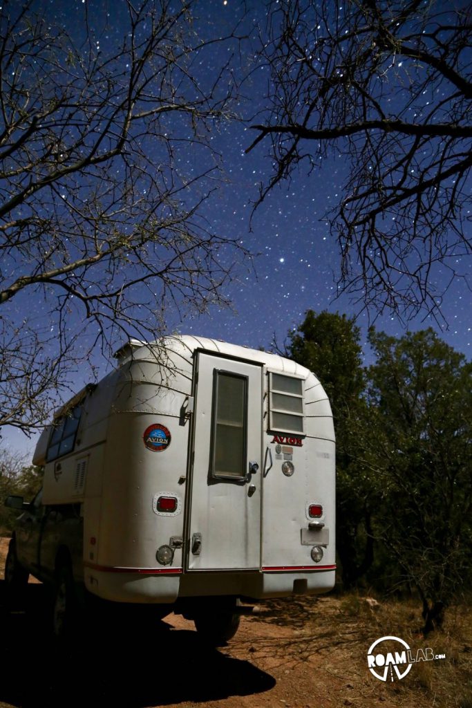 Avion Ultra truck camper in the moonlight