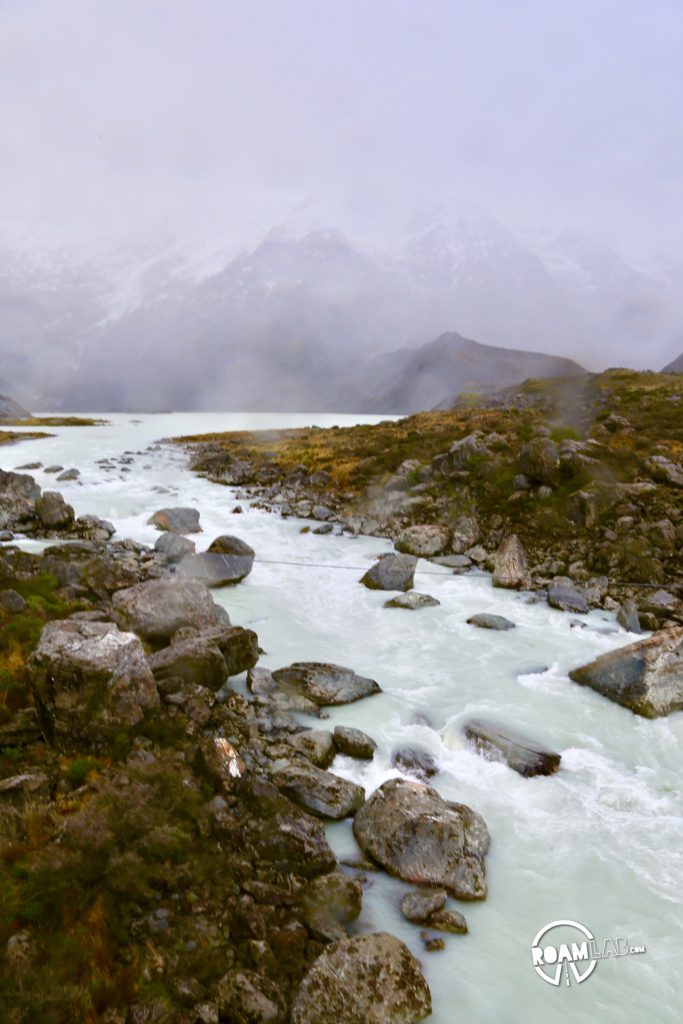 Contending against gale force winds to see a glacier on the Hooker's Valley Track along the Southern Alps in Aoraki/Mount Cook National Park.