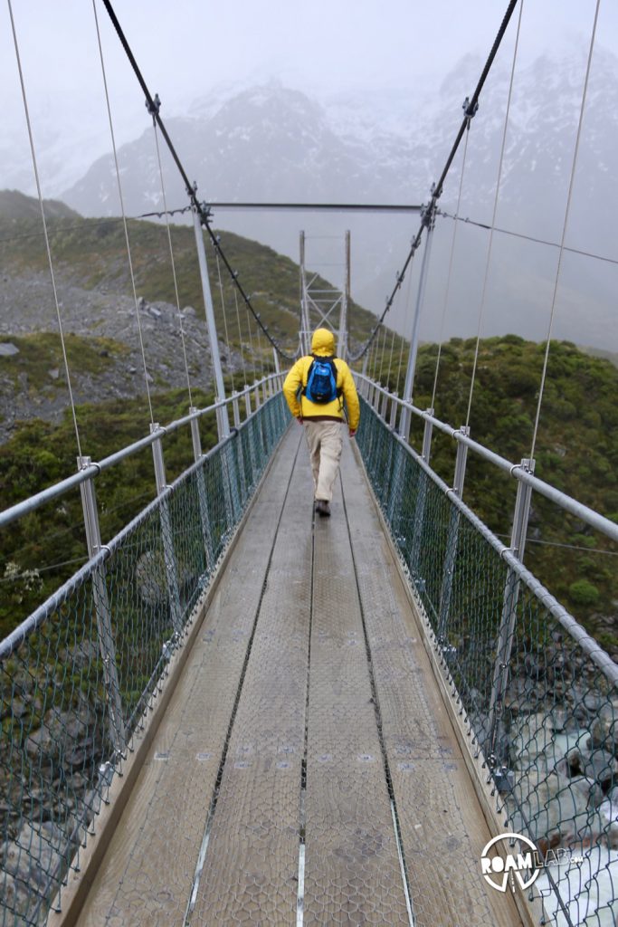 Contending against gale force winds to see a glacier on the Hooker's Valley Track along the Southern Alps in Aoraki/Mount Cook National Park.