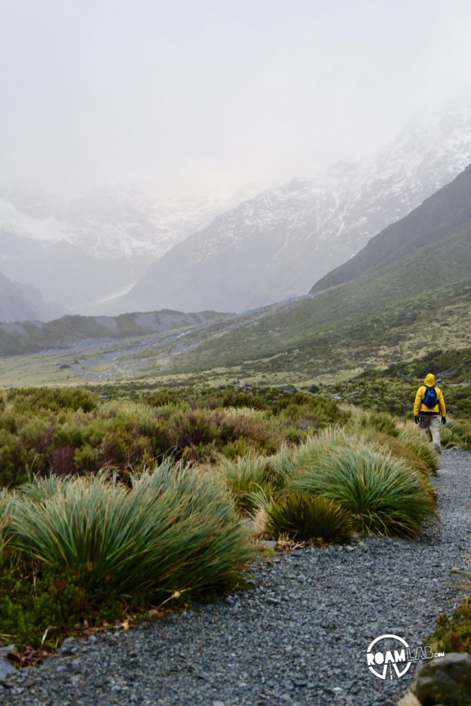 Contending against gale force winds to see a glacier on the Hooker's Valley Track along the Southern Alps in Aoraki/Mount Cook National Park.