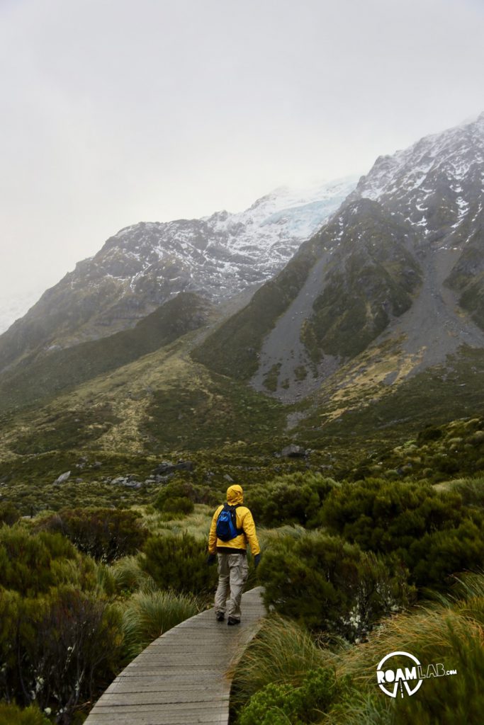 Contending against gale force winds to see a glacier on the Hooker's Valley Track along the Southern Alps in Aoraki/Mount Cook National Park.