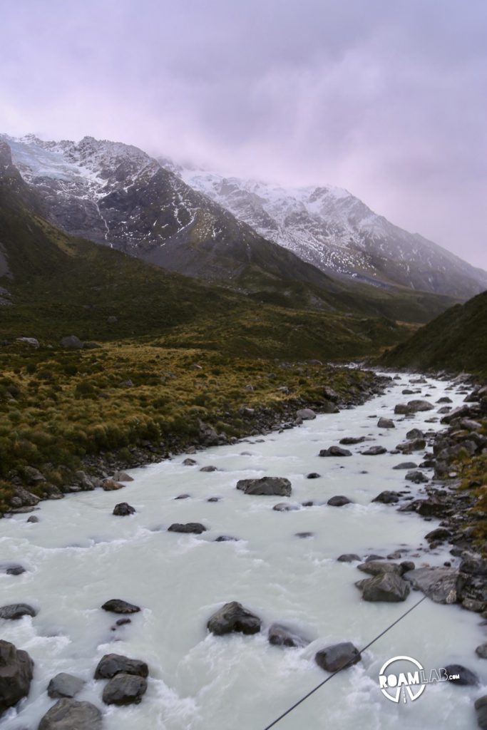 Contending against gale force winds to see a glacier on the Hooker's Valley Track along the Southern Alps in Aoraki/Mount Cook National Park.