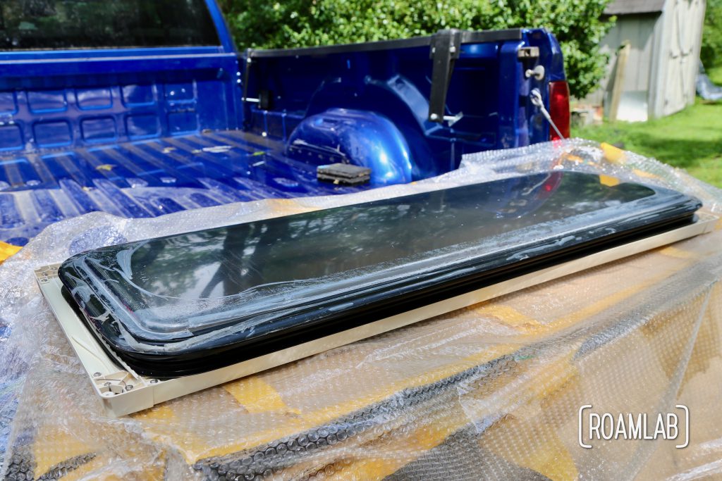Step-by-step DIY replacing of a leaky vintage truck camper cabover window by installing a new, double paned, aerodynamic, and modern RV window.