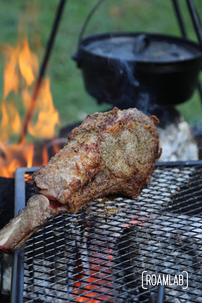 Grilling tomahawk steak over and open campfire is a challenging and delicious undertaking.