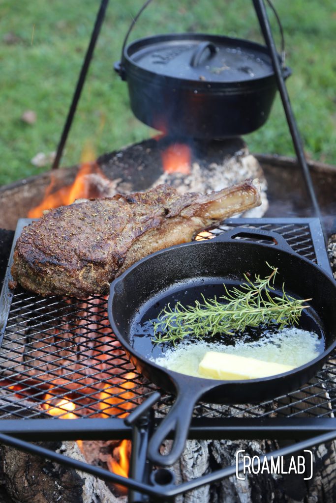 Grilling tomahawk steak over and open campfire is a challenging and delicious undertaking.