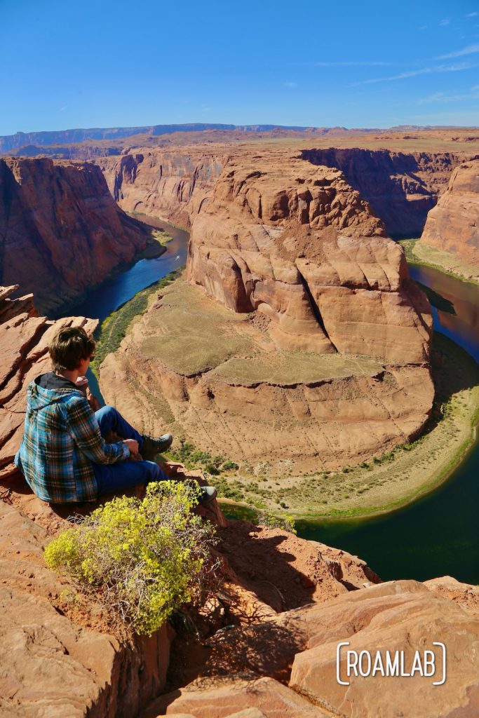 Sitting on the edge of Horseshoe Bend