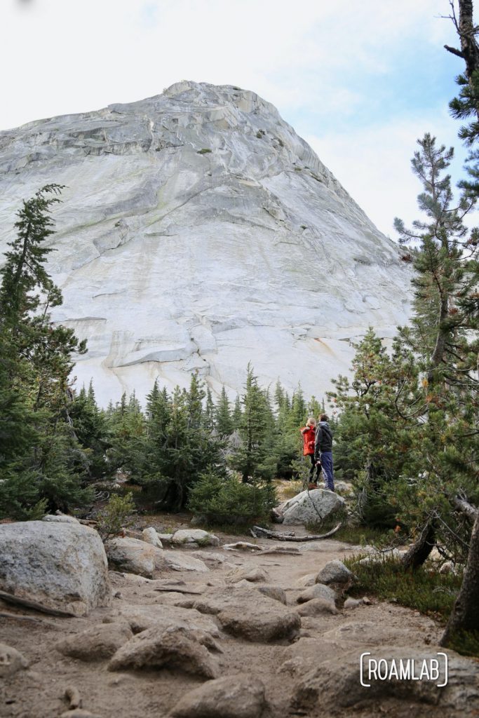 Hiking Cathedral Lakes Trail from Tuolumne Meadows to Lower Cathedral Lake, surrounded by Cathedral, Echo, and Tresidder Peaks in Yosemite National Park.