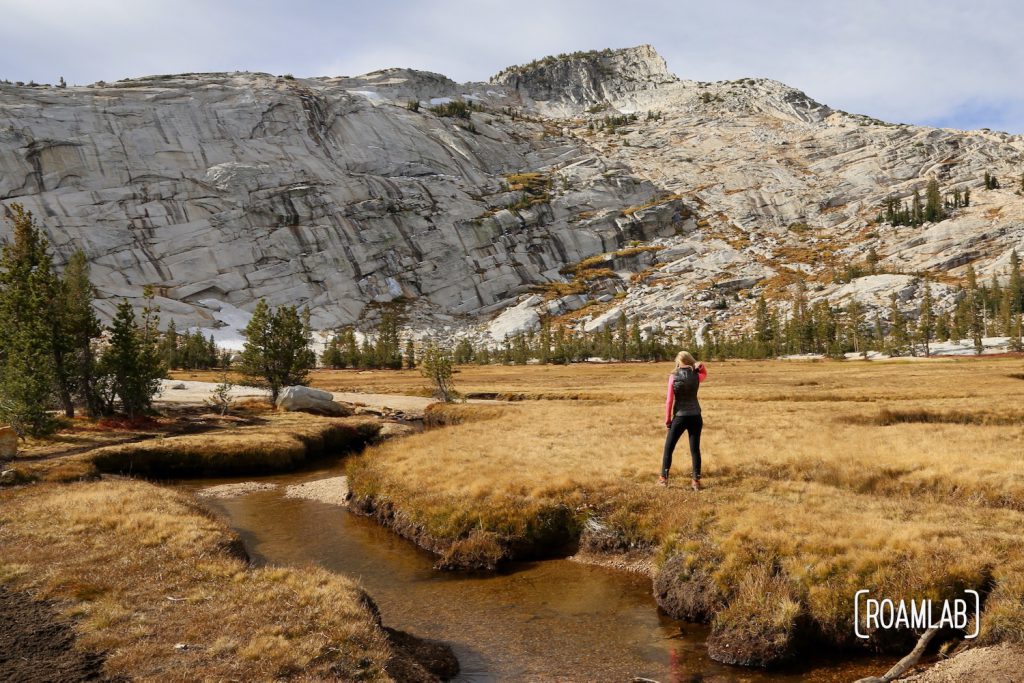 Hiking Cathedral Lakes Trail from Tuolumne Meadows to Lower Cathedral Lake, surrounded by Cathedral, Echo, and Tresidder Peaks in Yosemite National Park.