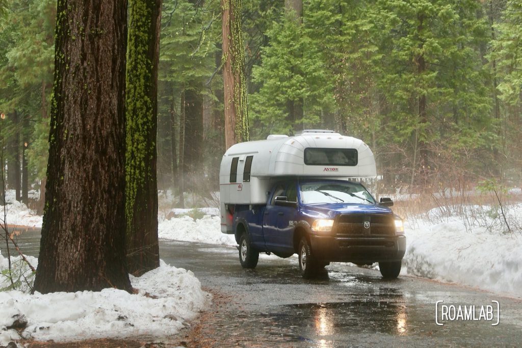 Hiking the North Grove Trail in the snow of Calaveras Big Trees State Park in the Sierras outside of Murphys, California and Highway 49.