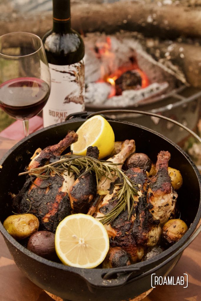 Roast this rosemary cornish game hen and potatoes recipe in a dutch oven over an open camp fire for a classy campground dinner or in your oven at home.