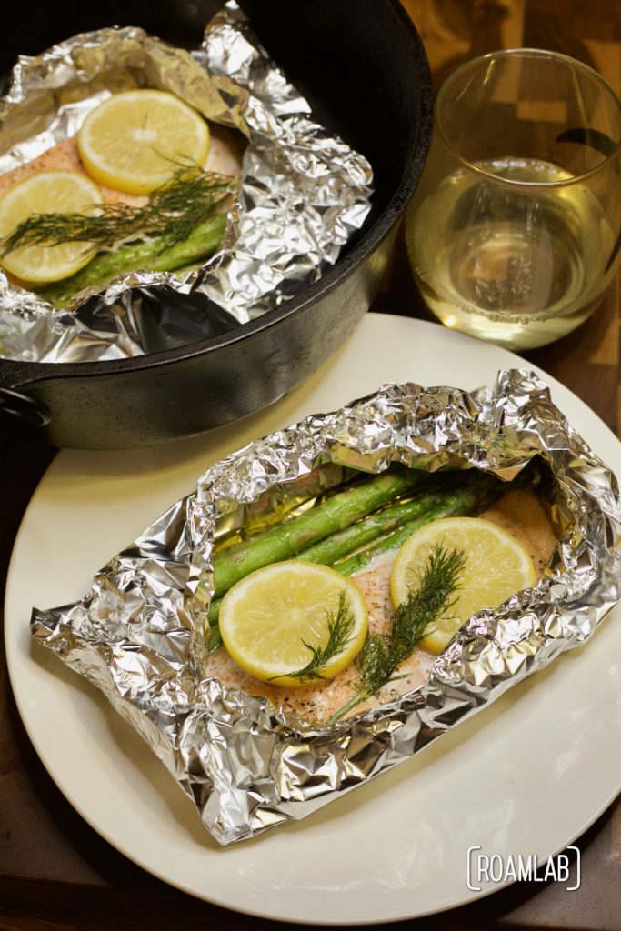 Enjoy this simple seafood course with our tin foil salmon campfire cooking dinner recipe. Add veggies with the fillet to make a full meal in one packet.