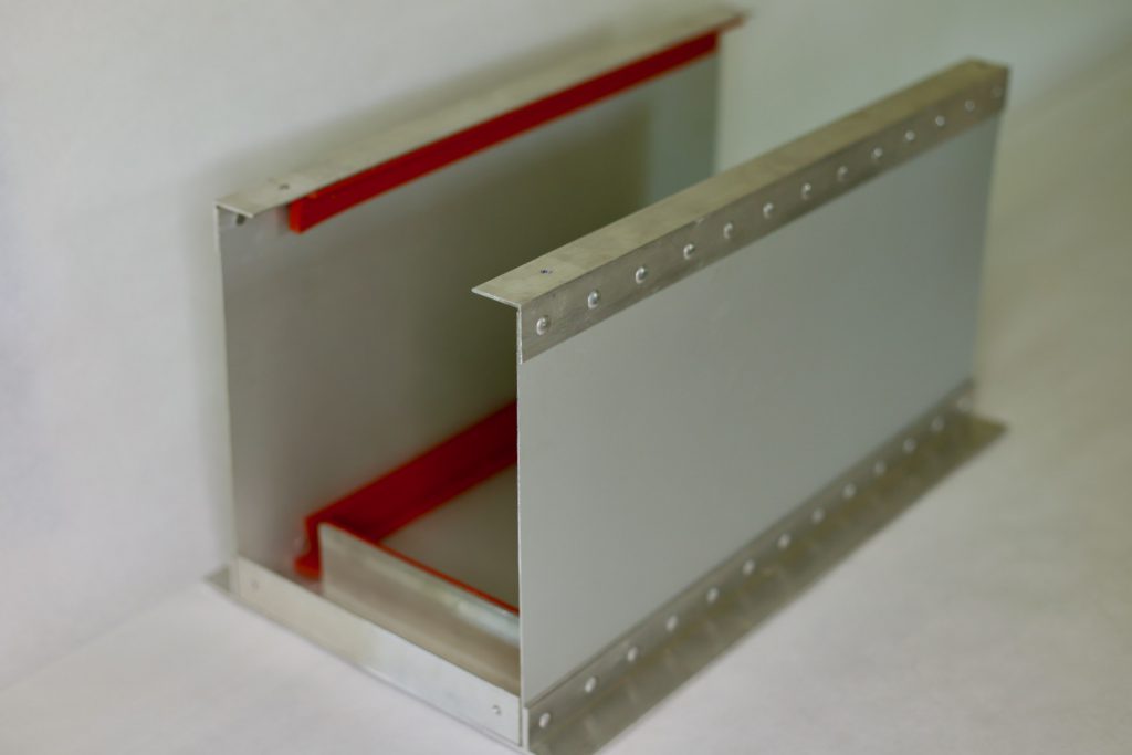 We make a custom battery box for our DIY lithium batteries featuring buck riveted aluminum, high impact rubber, and a plexiglass viewing window.