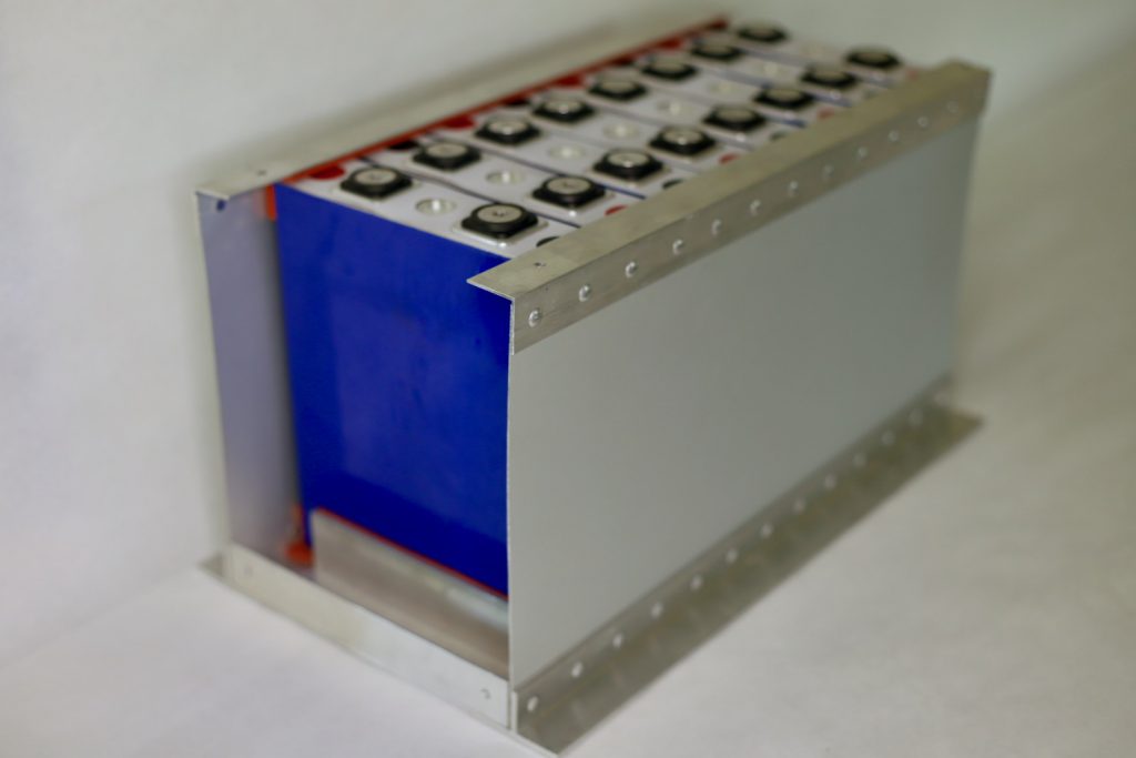 We make a custom battery box for our DIY lithium batteries featuring buck riveted aluminum, high impact rubber, and a plexiglass viewing window.