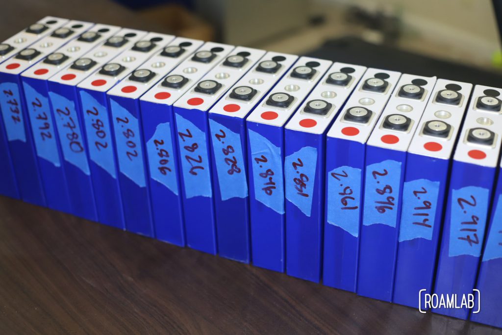 Sorting battery cells by voltage.