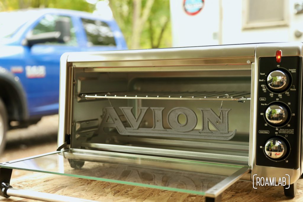 Avion emblem ready to cure the chrome powder coat in a toaster oven.