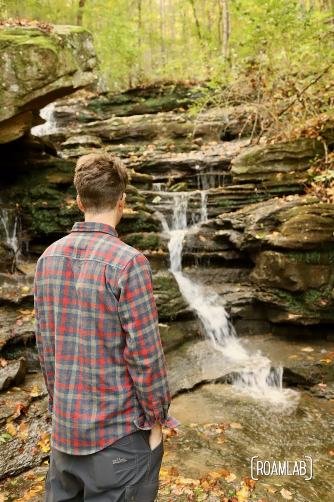 Man looking at waterfall in the Prentice Cooper State Park.