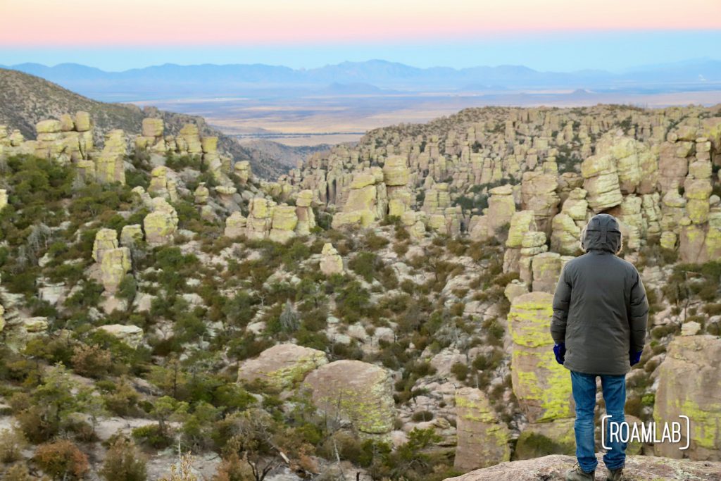 Man taking in the sunrise at Echo Canyon Loop Trail at Chiricahua National Monument Arizona