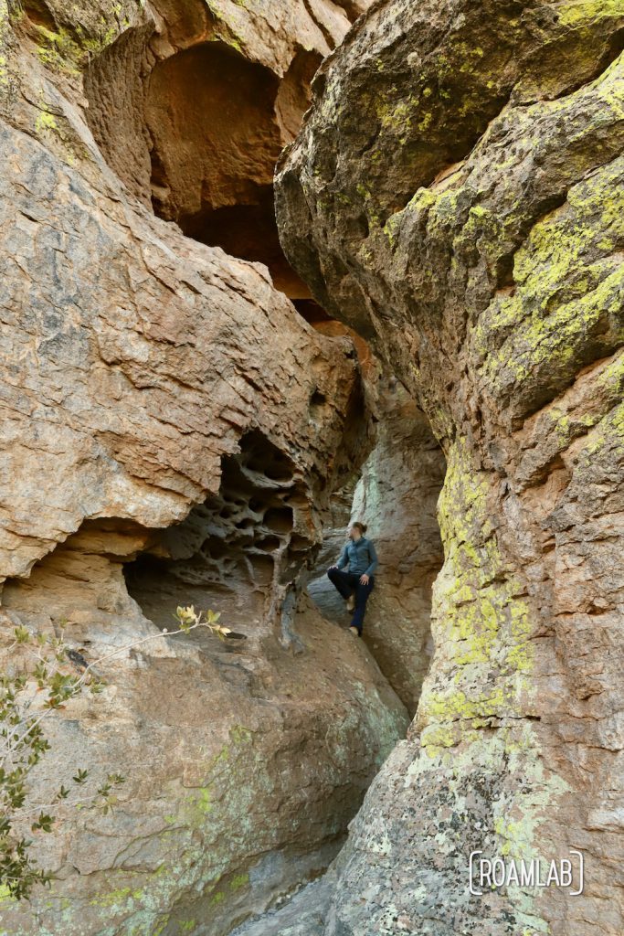 Woman exploring the rock formations along Echo Canyon Loop Trail at Chiricahua National Monument Arizona