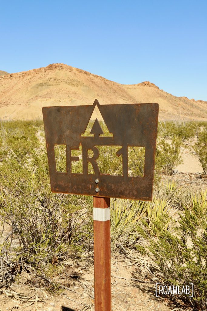 Cut sheet metal "FR 1" sign for Fresno Campsite off River Road in Big Bend National Park, Texas.