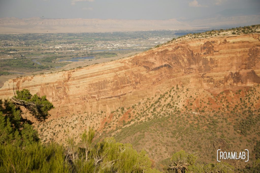 Book Cliffs in Colorado National Monument with Grand Junction in the background.