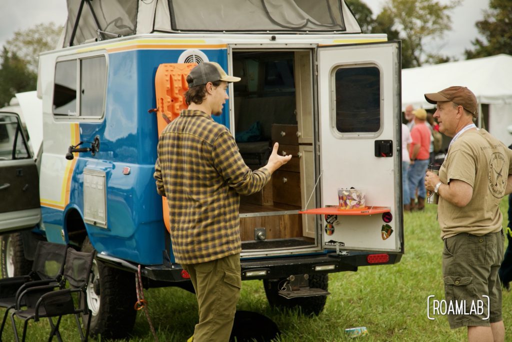 Man presenting his Chinook at Overland Expo East 2021 in Arrington, Virginia.