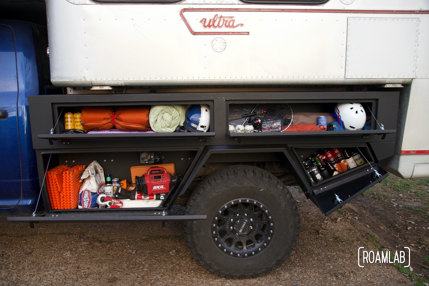 View in a Bowen Customs truck bed storage boxes loaded with camping gear.