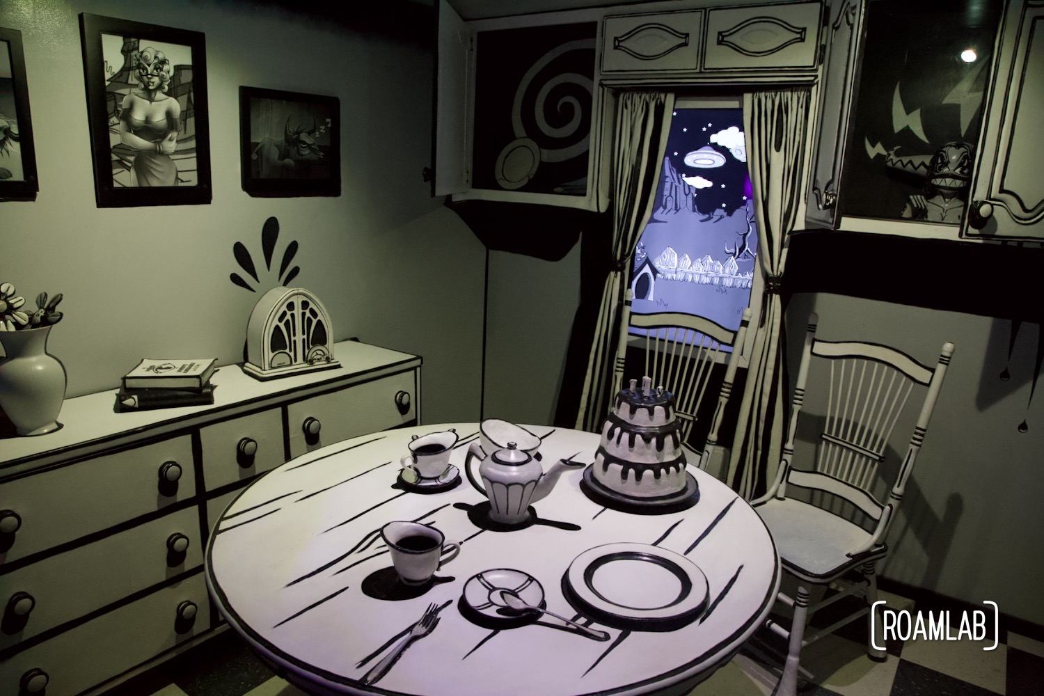 A kitchen scene but in the style of a black and white cartoon at the House of Eternal Return, Meow Wolf's Santa Fe, New Mexico Location