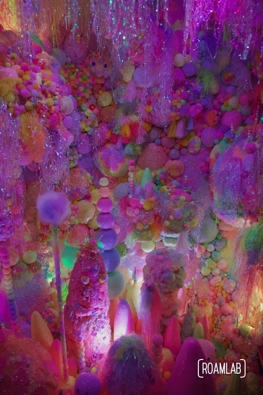 A colorful display that both looks like candy, smells like candy, but is not candy at the  House of Eternal Return, Meow Wolf's Santa Fe, New Mexico Location