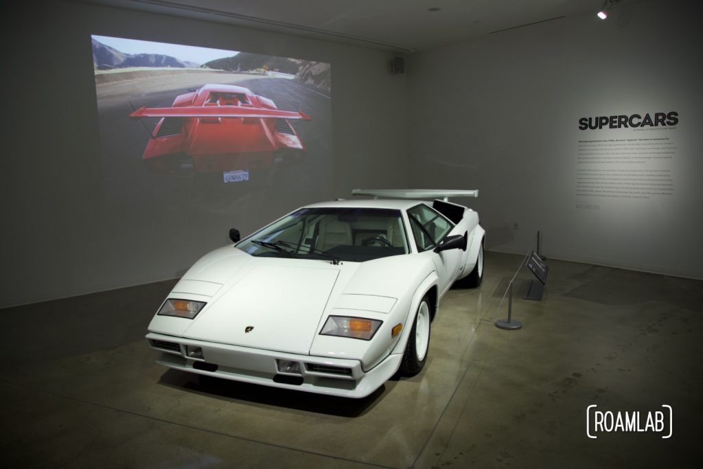 A white 1985 Lamborghini Countach LP 500S in the Supercars exhibit at the Petersen Automotive Museum.