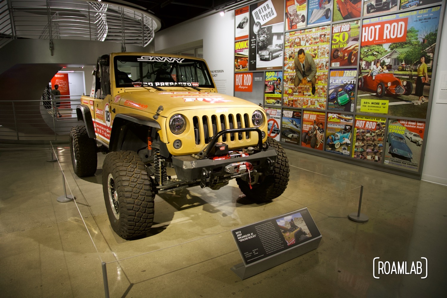 Golden brown 2013 Jeep Wrangler JK on display at the Petersen Automotive Museum