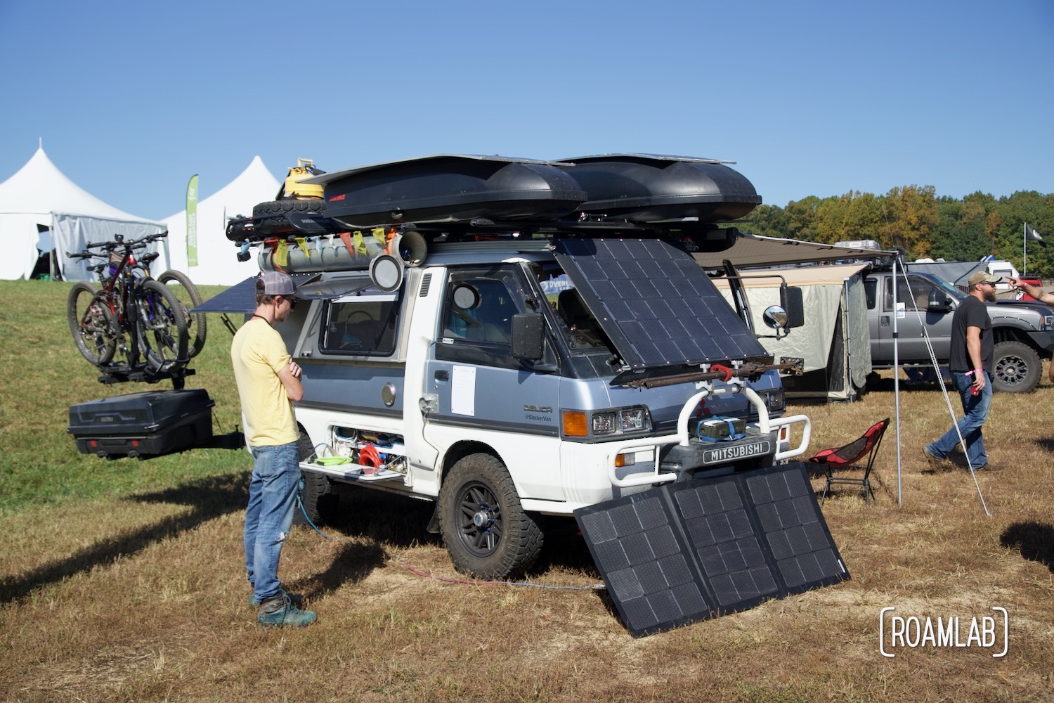 Slacker Van with solar panels deployed at the DIY Showcase during Overland Expo East 2022.