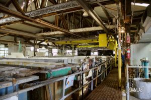 A view down the walkway and crane at the Southern Aluminum Finishing Co. warehouse.